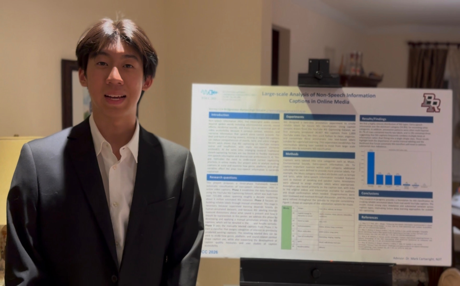 Wesley presenting his research poster